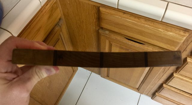 Warped wooden cutting board.